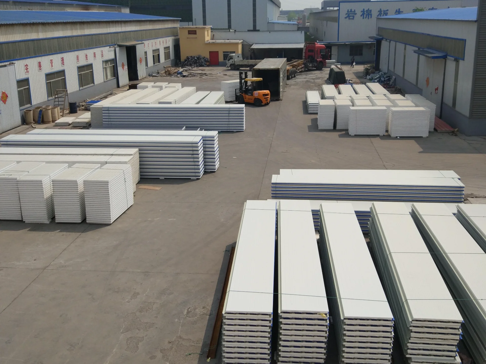 Stacked insulation panels factory yard