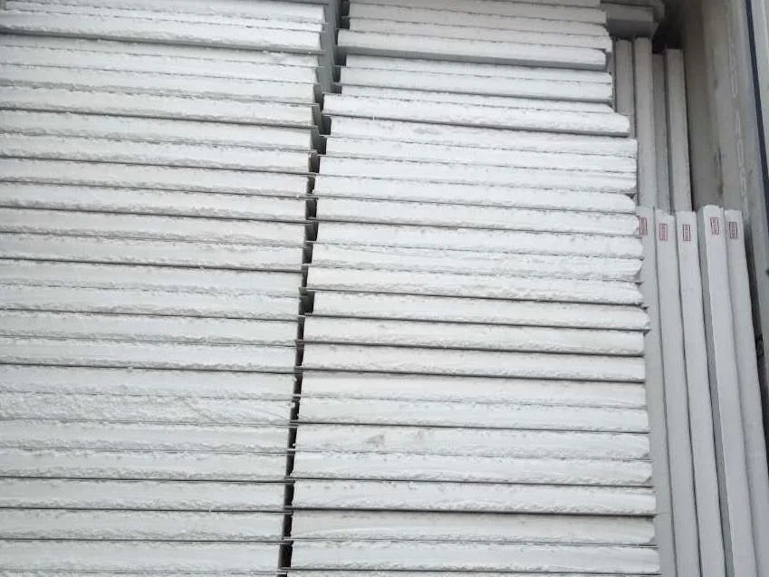 Stacked white gypsum boards